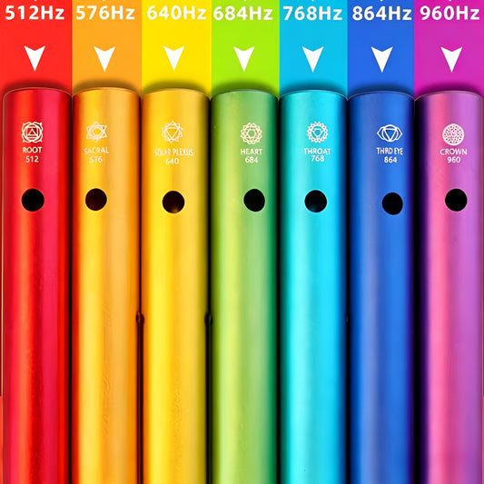 7 Chakras Wah-Wah percussion tubes; rainbow-colored 7-piece hand bells with Hz labels