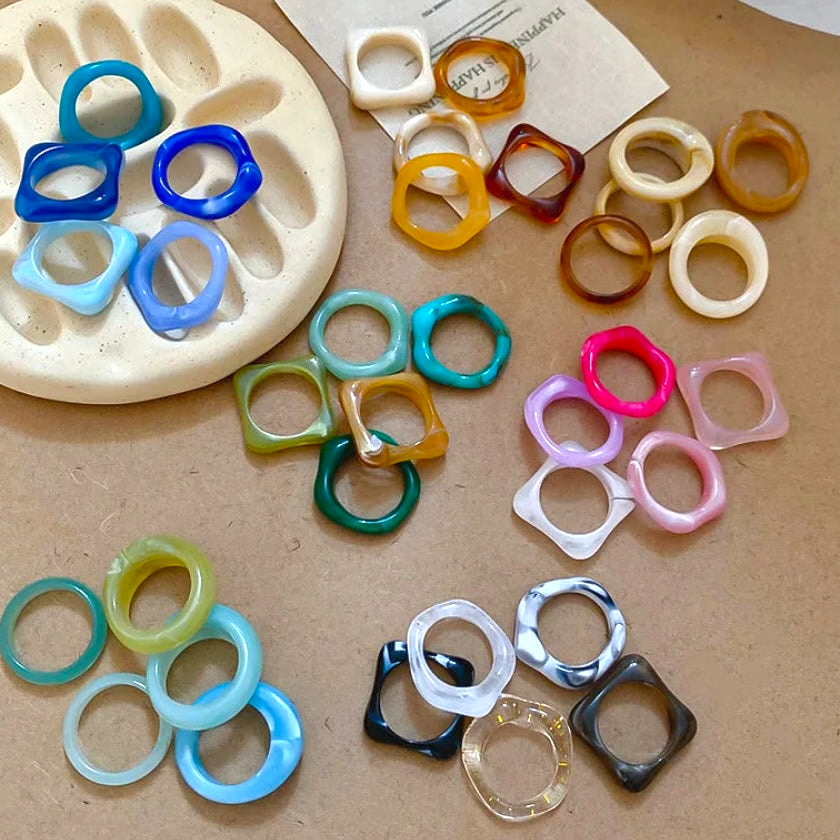 Smudged acrylic fashion rings in assorted bright colors and shapes
