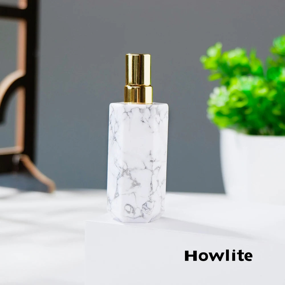 Natural crystal gemstone perfume bottle approximately eight centimeters tall